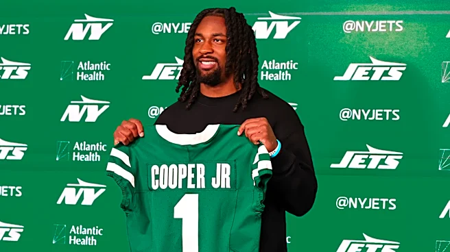 Omar Cooper signs his rookie contract