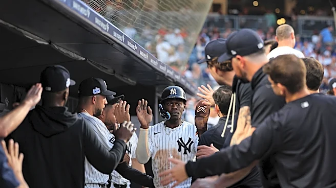Yankees back in first-place tie as two-homer eighth keys win over Red Sox