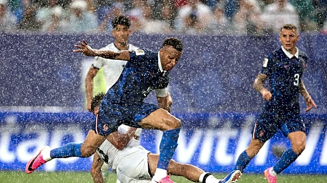 Storms cause havoc as Mbappé scores two for France against Iraq