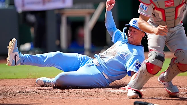 Royals beat Phillies on hot day in Sunday matinee