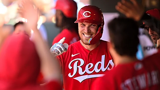 Reds blast past Rockies in homer-fest to take series