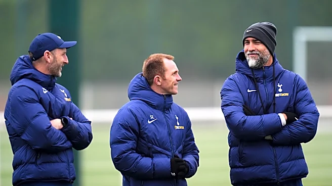 Tottenham academy coach Stuart Lewis leaving for Ipswich