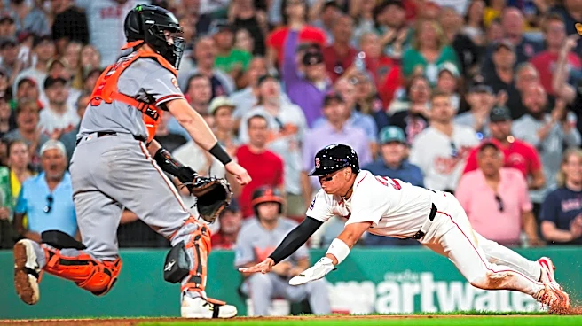 Orioles’ defensive gaffes hand Red Sox their 14th straight win