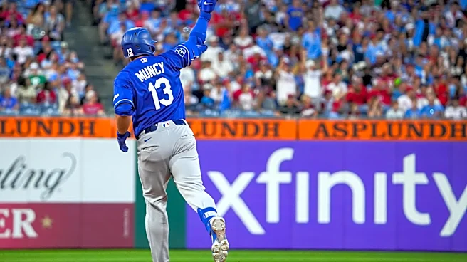 Max Muncy plays hero again, Dodgers top Phillies 9-5
