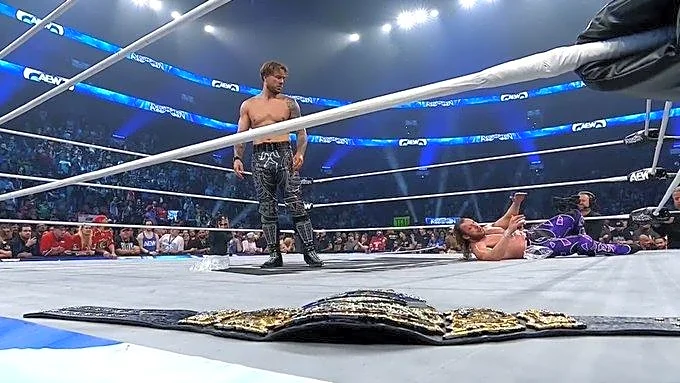 Omega retains AEW title, almost gets murdered by Ospreay and Death Riders