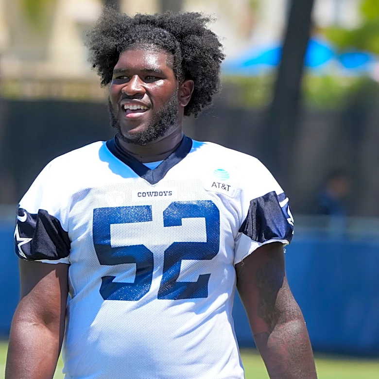 Brian Schottenheimer: Tyler Booker will get training camp work at center