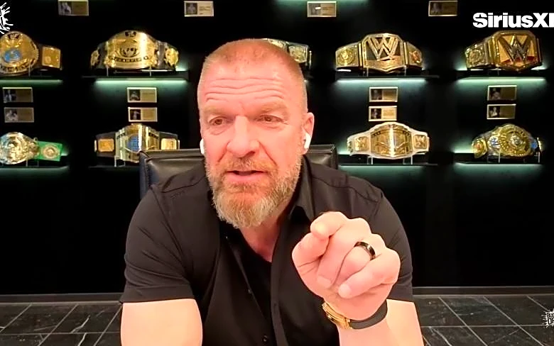 Triple H dismisses WWE as a real sport, reveals Brock Lesnar is mentoring Oba Femi