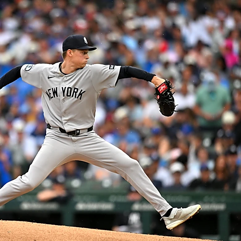 Yankees win opener at Wrigley as Jones and Rosario both homer while Warren rebounds