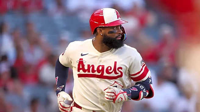Adell to Cleveland, Ward to Seattle, per reports