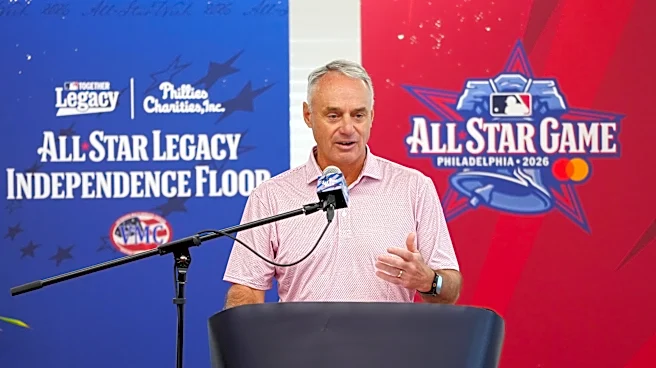 Would Major League Baseball be better with a salary cap/floor?