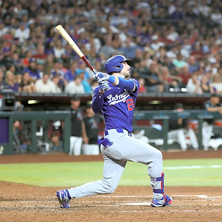 Dodgers need extra innings to snap their seven-game losing streak