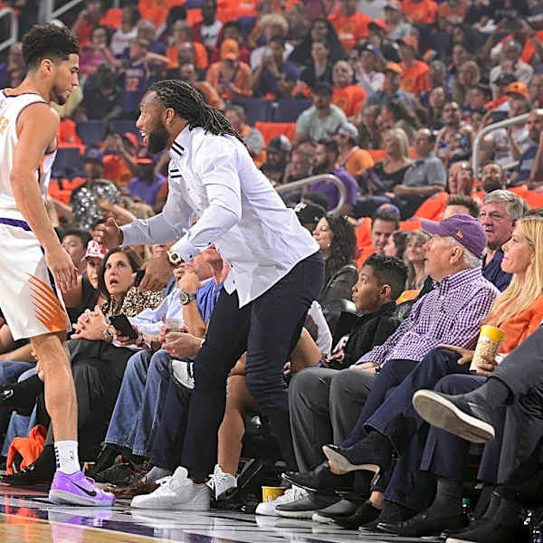 Devin Booker watched as Larry Fitzgerald completed a rare Arizona story