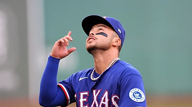 Rangers add Gonzales, Freeman