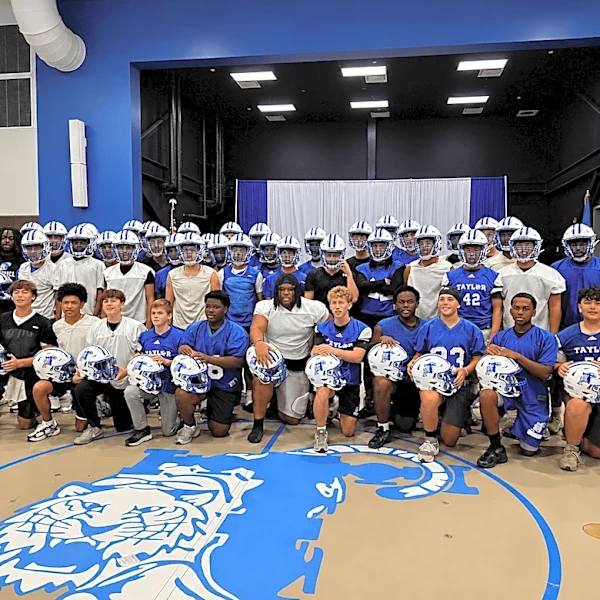 Saints surprise Patrick F. Taylor Football Program with $25,000 helmet donation