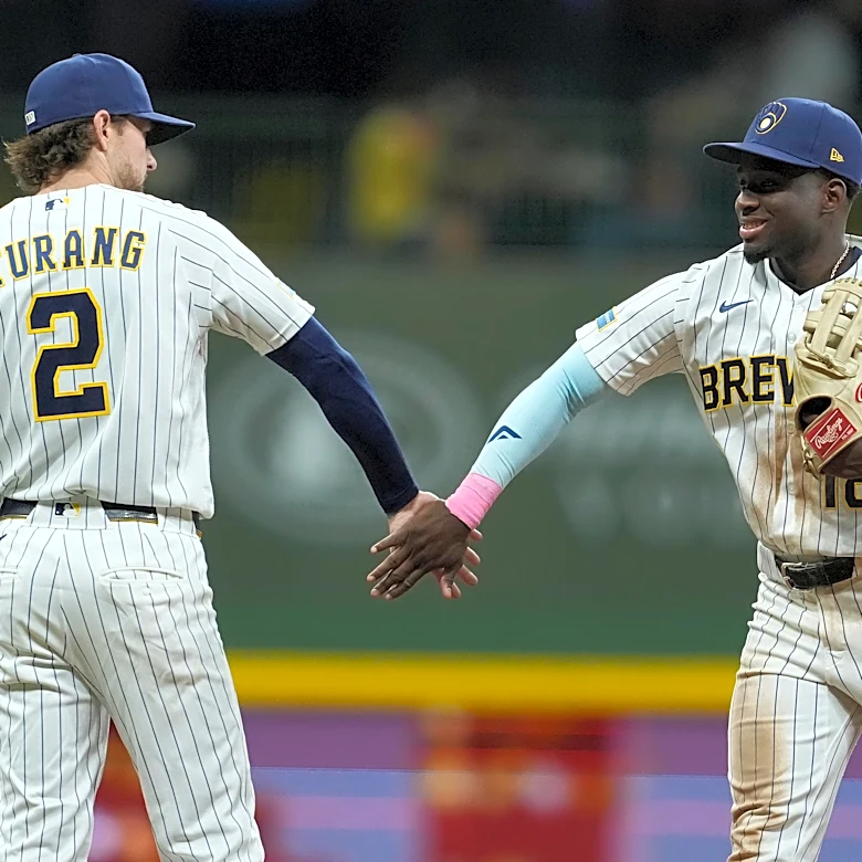 Brewers strike early, hold on late for 5-3 win over Rangers