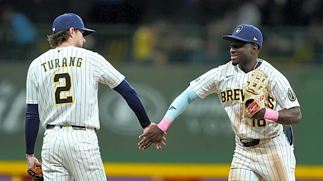 Brewers strike early, hold on late for 5-3 win over Rangers