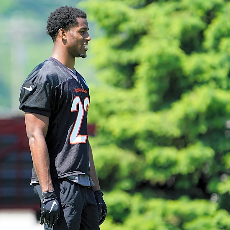 Dax Hill returns to practice
