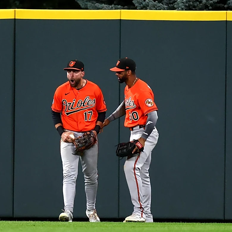 Rockies robbed on rainy night, fall to Orioles 2-1
