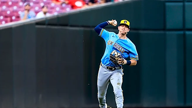 Brewers pick up 10-7 win over Reds in another wild game