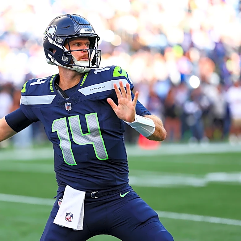 Seahawks quarterback Sam Darnold injured on opening series, taken to locker room