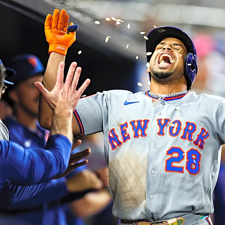 Mets offense outlasts Marlins in marathon win
