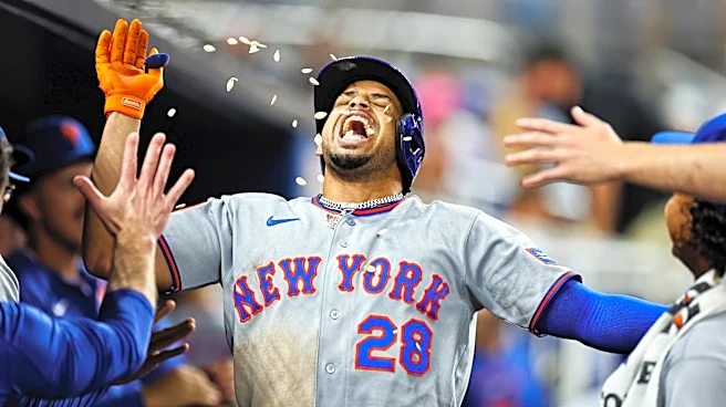 Mets offense outlasts Marlins in marathon win