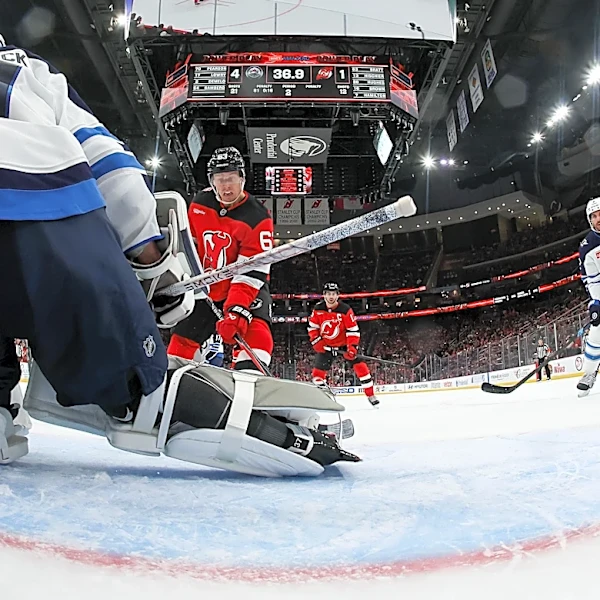 If The New Jersey Devils Manage to Acquire Quinn Hughes or Connor Hellebuyck, How Much Does it Change the Season Outlook?