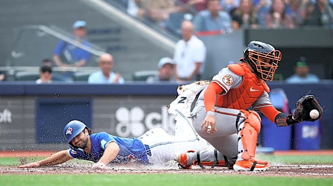 Blue Jays bash birthday boy Bradish, beat Birds, 7-3