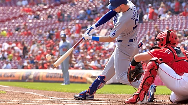 The fat lady was an early Singer; Dodgers clinch the West