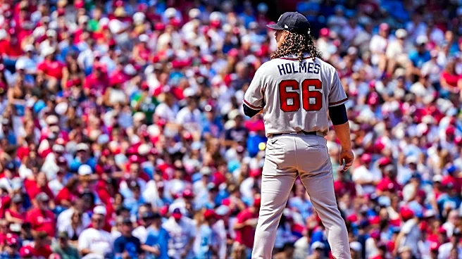 Braves seek series win in Houston with Holmes on the hill