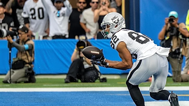Cody White, Hezekiah Masses double up to help Raiders zap Chargers 26-14