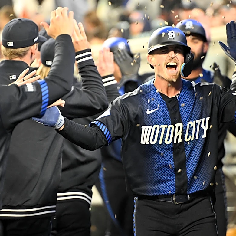 Tigers launch three homers in series-opening win