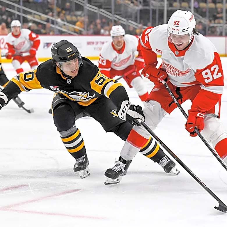 Penguins cut 12 more players