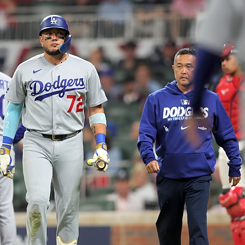 Miguel Rojas leaves NLDS Game 3 with lower back pain
