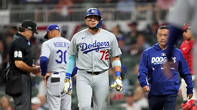 Miguel Rojas leaves NLDS Game 3 with lower back pain
