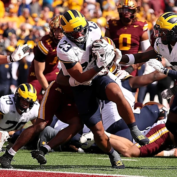 Michigan Football’s offensive line is looking to get ‘downhill’ run game going