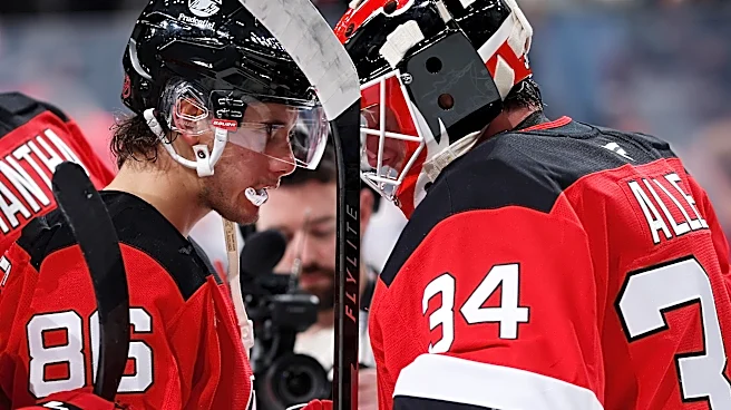 Devils Dominate Canucks in 4-1 Win in Milestone Games for Allen and Hischier