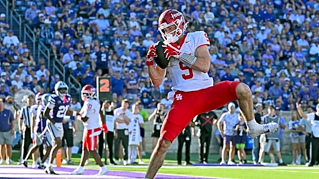 Overmyer’s 4 TD ties FBS record; Houston makes 35-16 statement at Kansas State