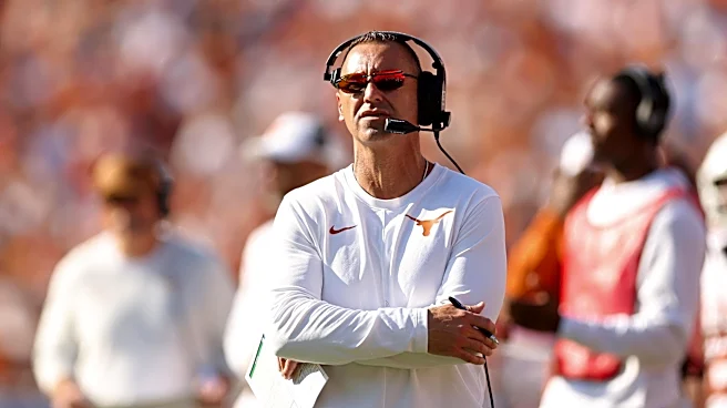 Texas drops in both polls after loss to Oklahoma