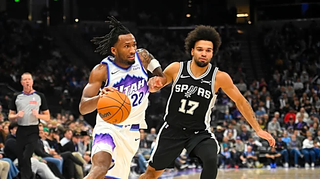 Jazz control 199-109 in preseason action against limited Spurs squad