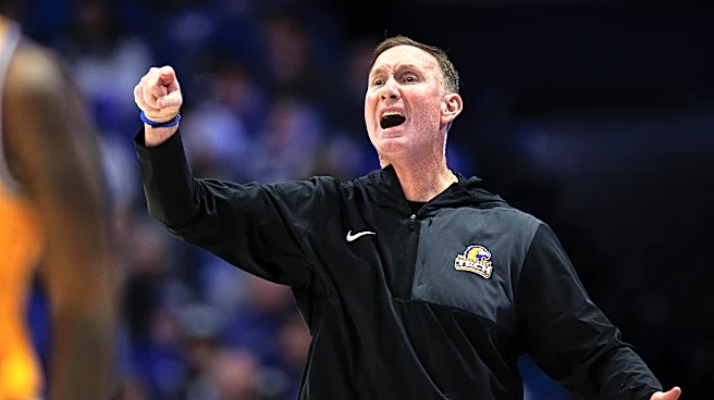 Mark Pope reacts to John Pelphrey hiring