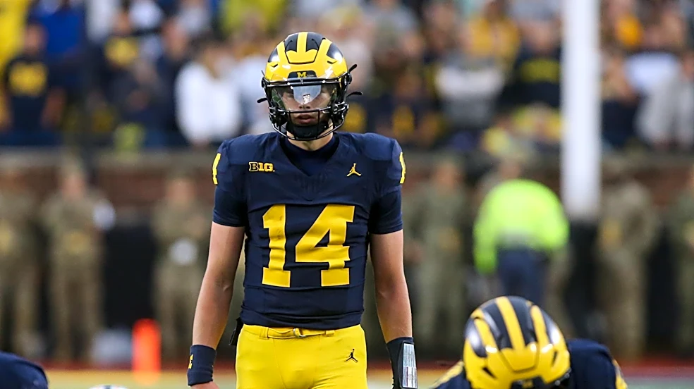 How many games can Michigan win the rest of regular season if Tommy Carr is QB1?