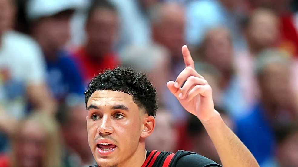 Louisville opens exhibition season with 89-83 win at Kansas