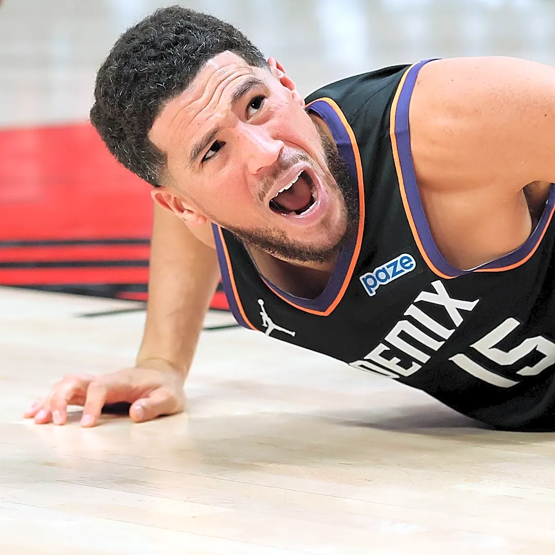 Devin Booker attempts zero threes in Suns’ season-opening 41-point loss