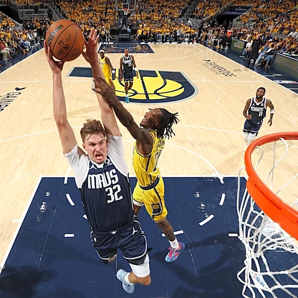 Cooper Flagg exits game at Indiana Pacers with injured shoulder after Nesmith flagrant foul