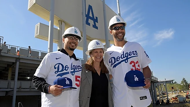 Dodgers notes: Janet Marie Smith, Todd Benzinger, Dave Roberts