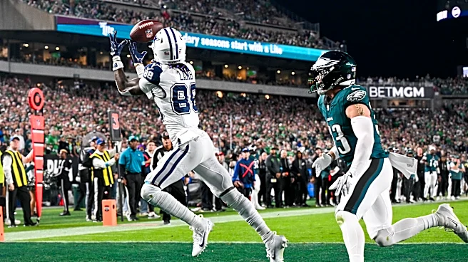 Cowboys beat Eagles to stay alive in NFC East race