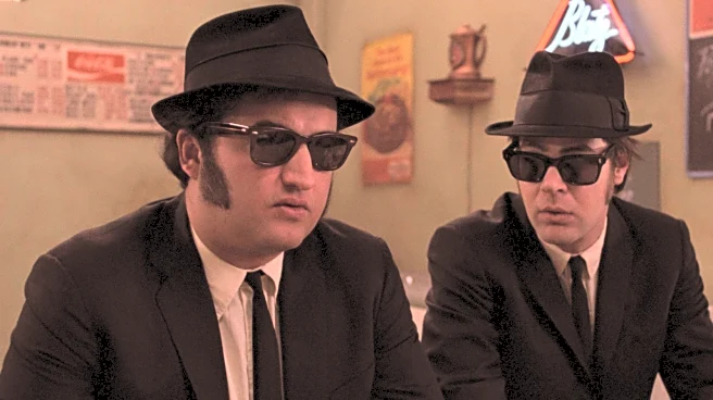 John Belushi's Final Role On A Leslie Nielsen Series Is Impossible To Watch Now