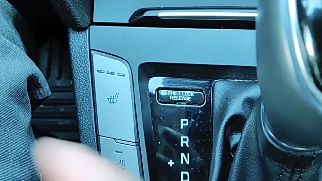 What Is The Little Button Next To Your Car's Gear Shift For?