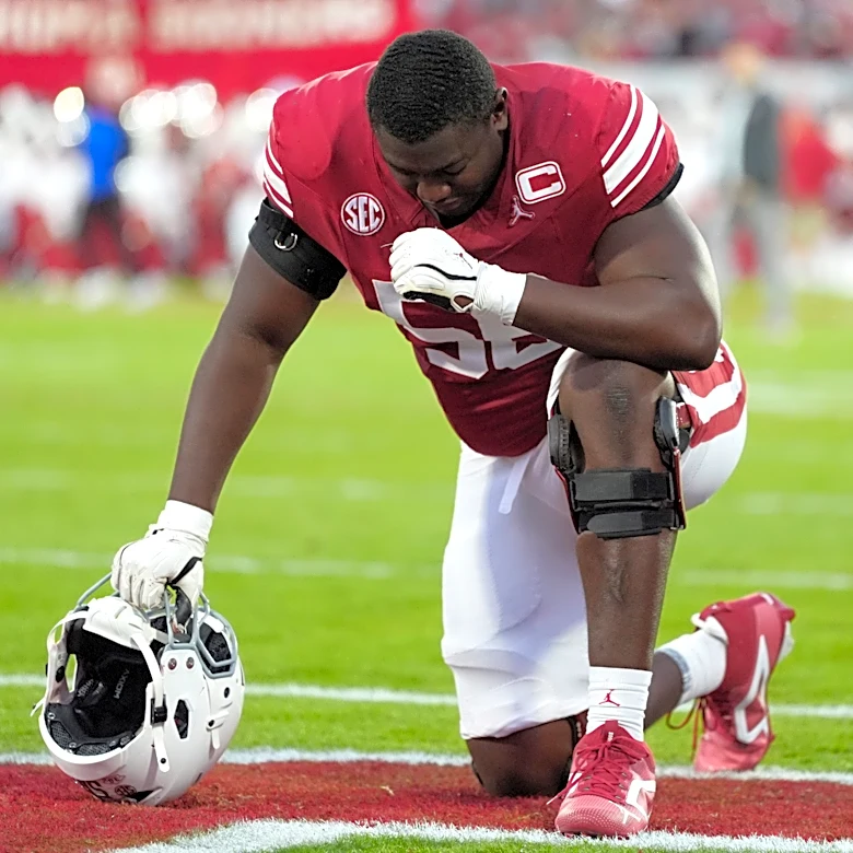 Michael Fasusi explains why he suited up this year despite being out
